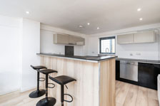 Open plan kitchens with breakfast bars
